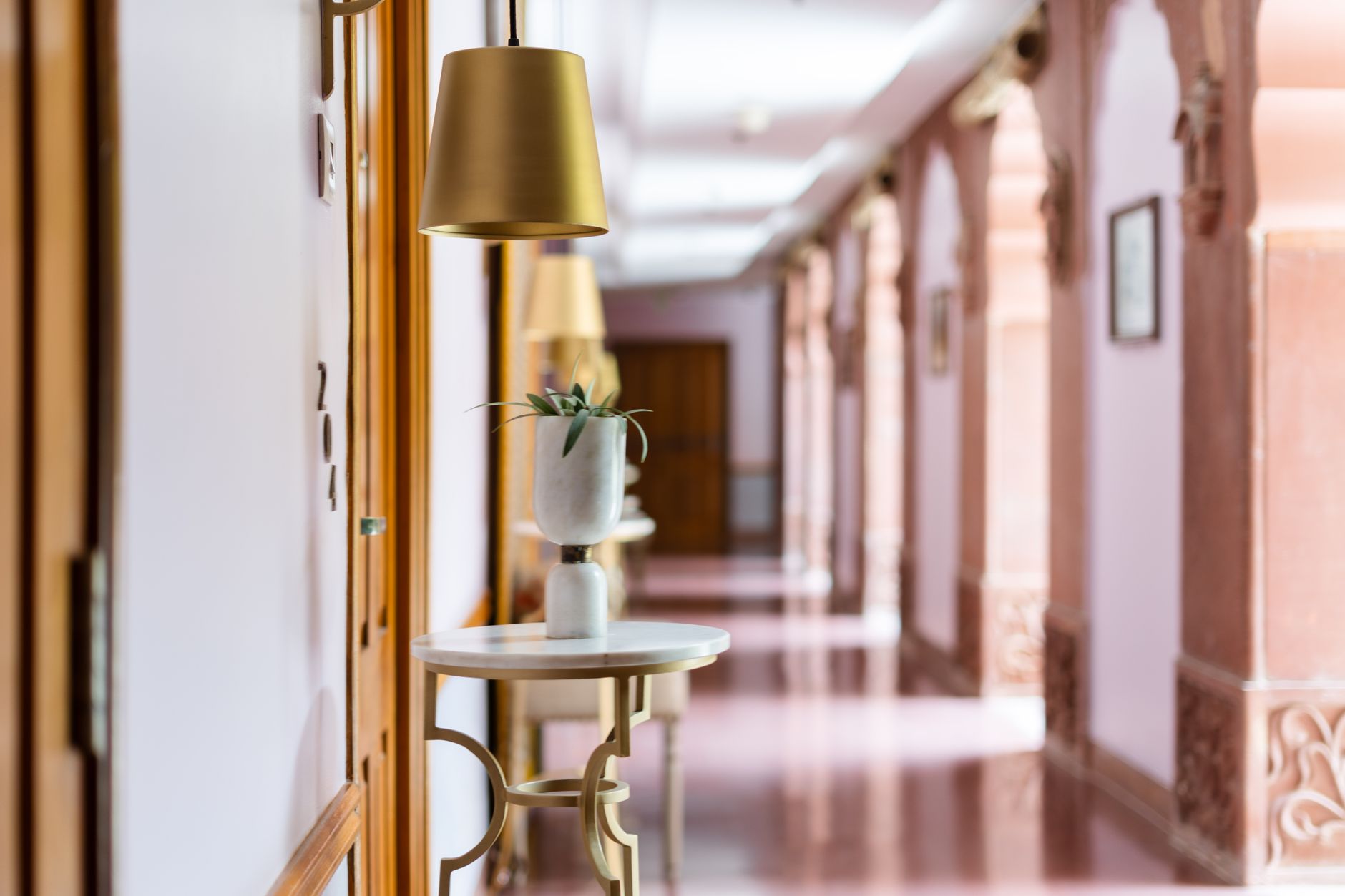A warmly lit residential corridor