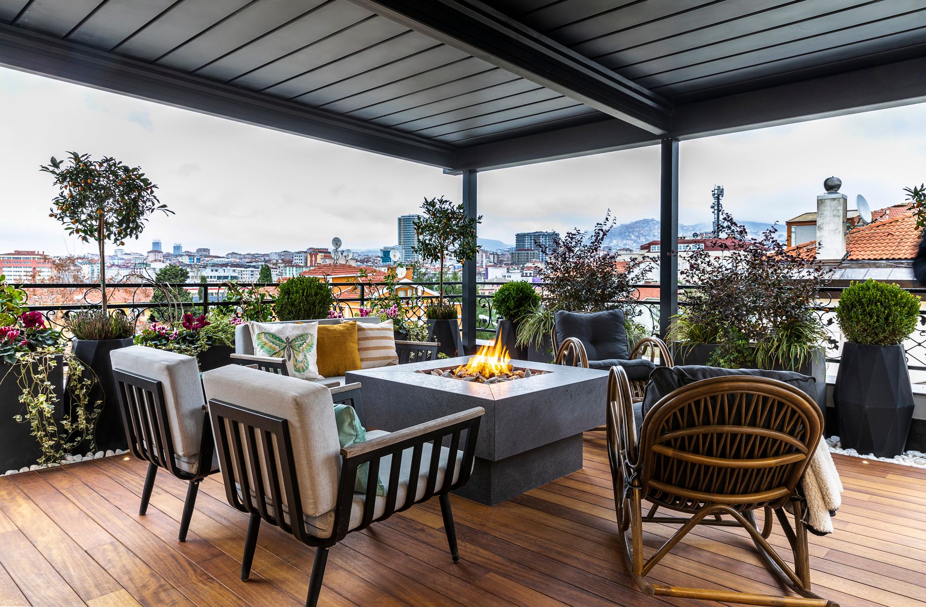 A rooftop terrace lounge in the evening