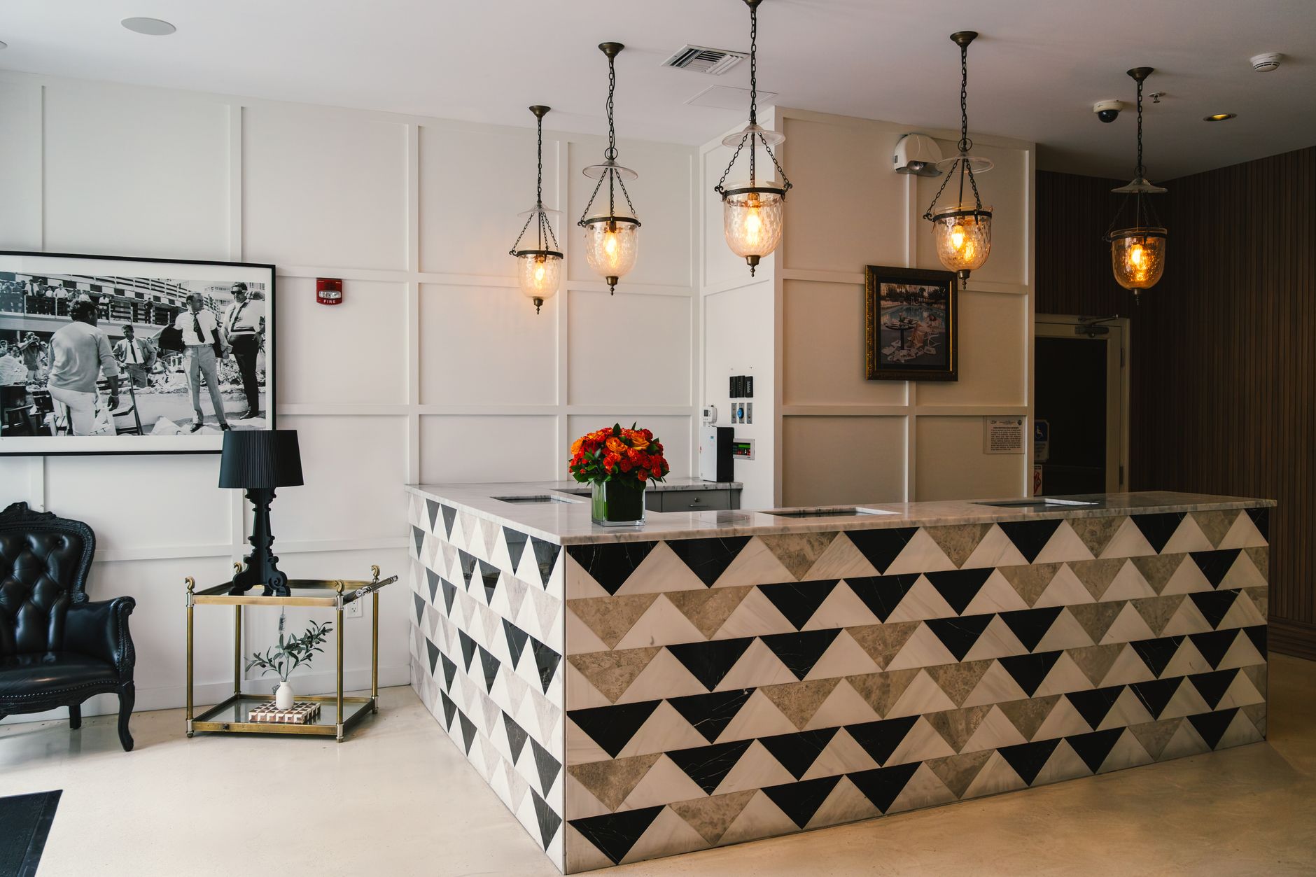A boutique building lobby with brass lighting